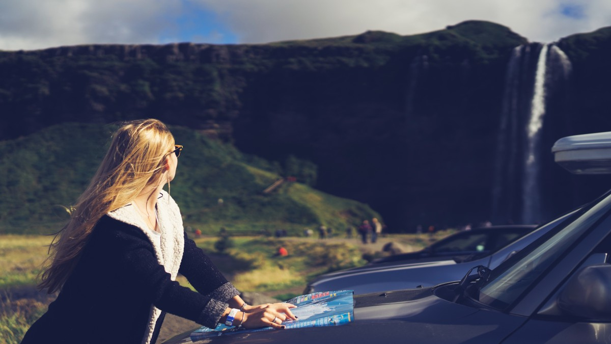 Woman viewing waterfall