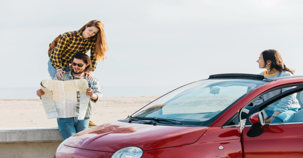 Friends planning a beach road trip